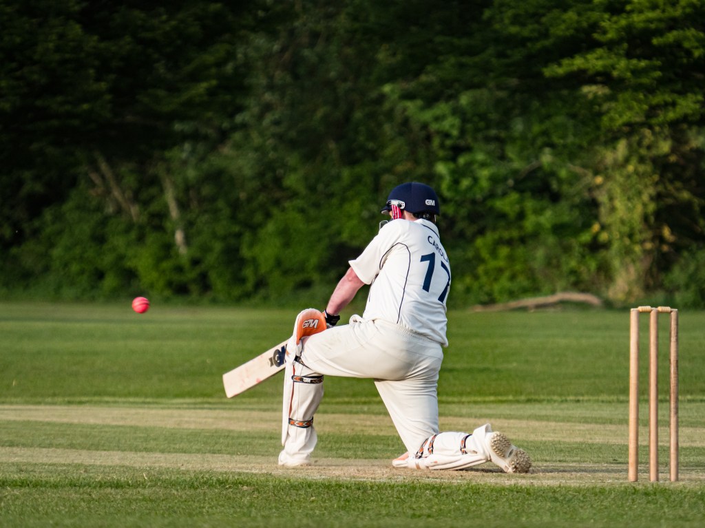 Village cricket batsman playing for Winchester cricket club at North Walls Recreation Ground